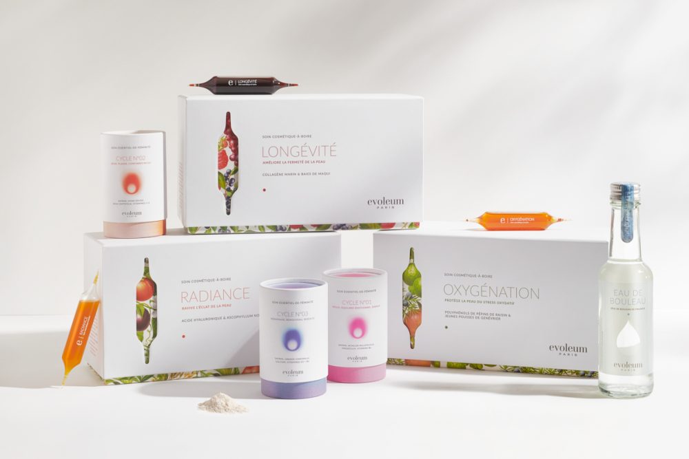 photographe Photographe beauté à Paris : produits LONGÉVITÉ, RADIANCE, OXYGÉNATION en packshot mode avec poudre et flacon sous lumière douce. Paris